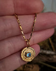 Gold Orb Pendant in Blue Topaz