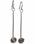 Pair of silver spiral earrings on a white background