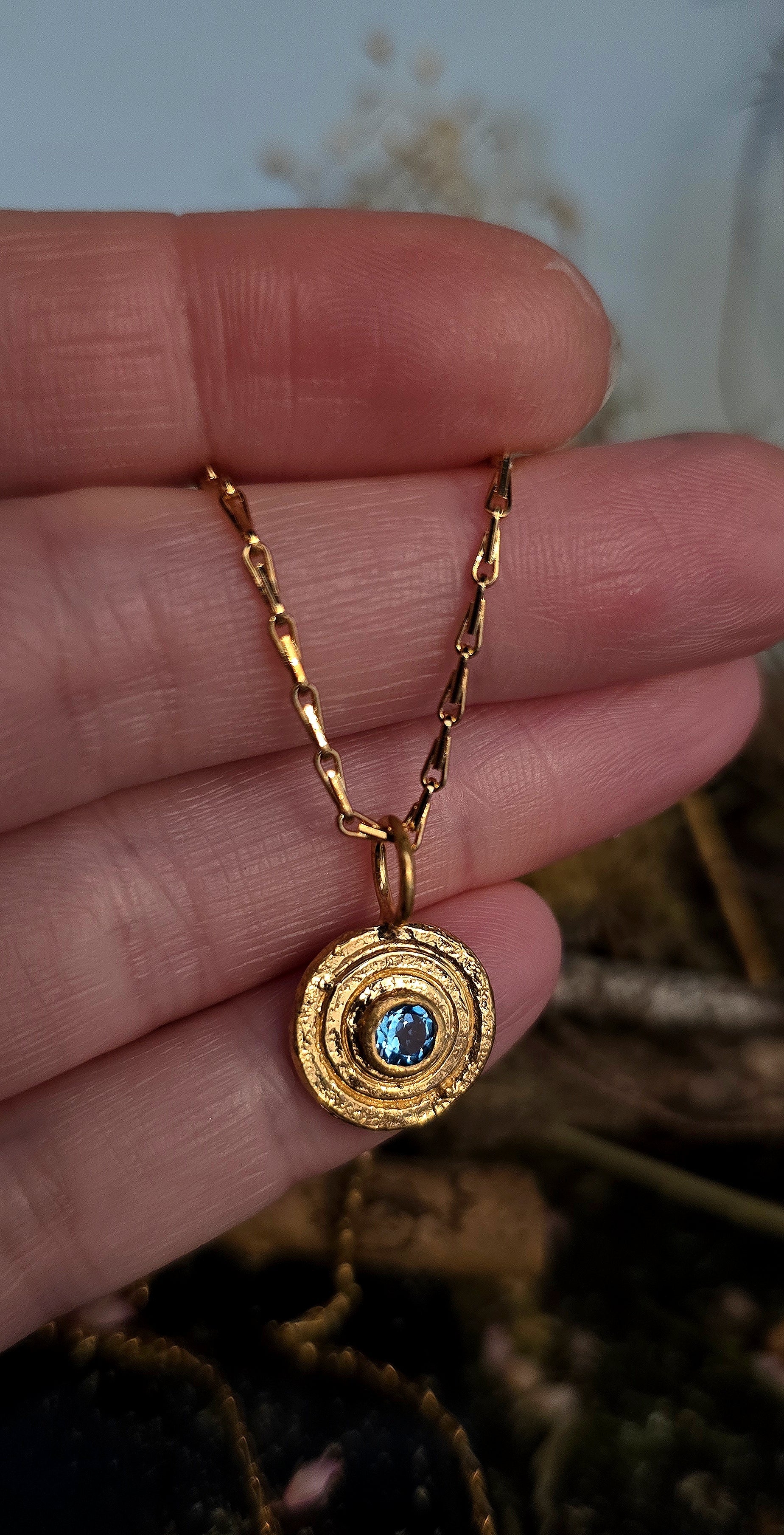 Gold  Orb Pendant in Blue Topaz