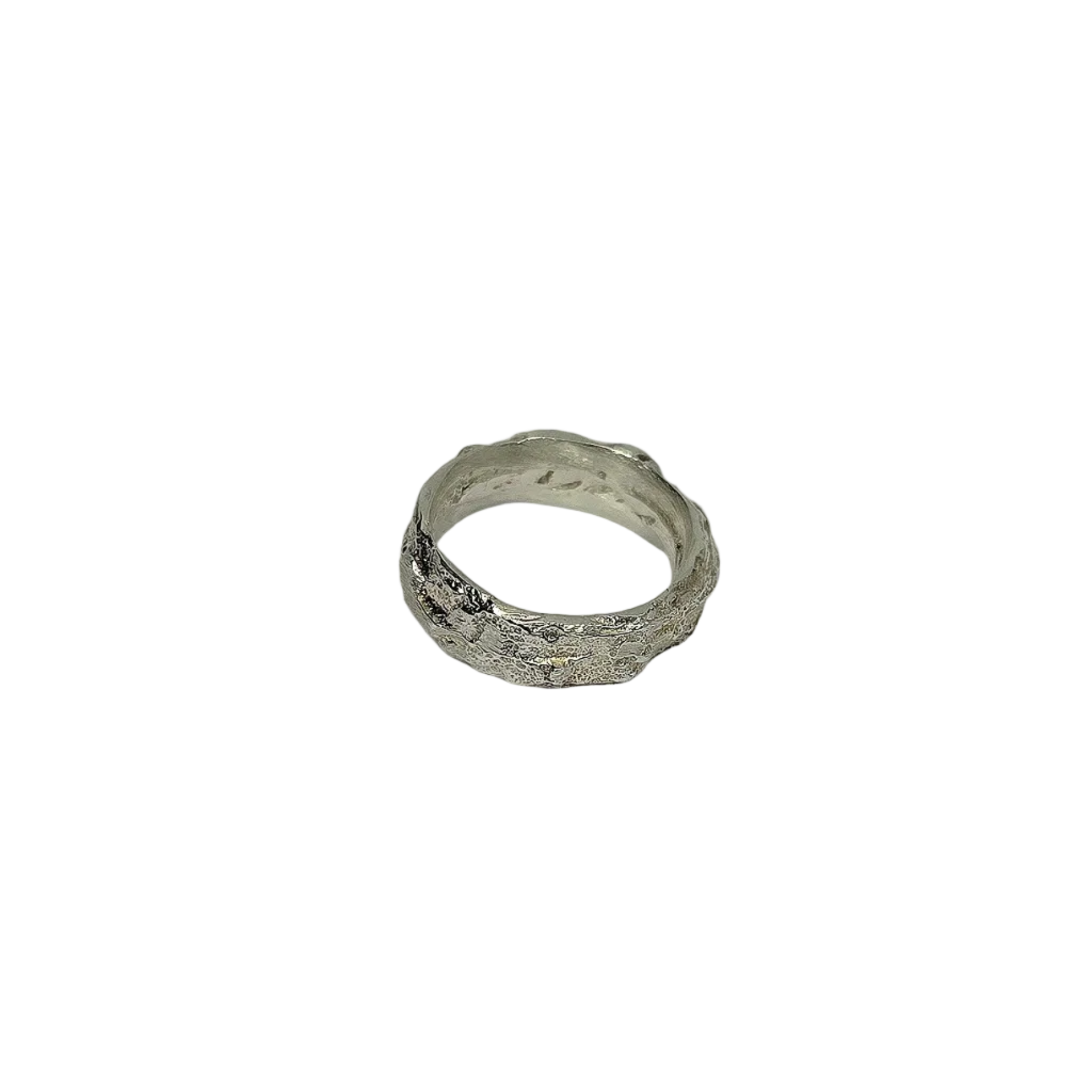 Silver ring on a light gray background