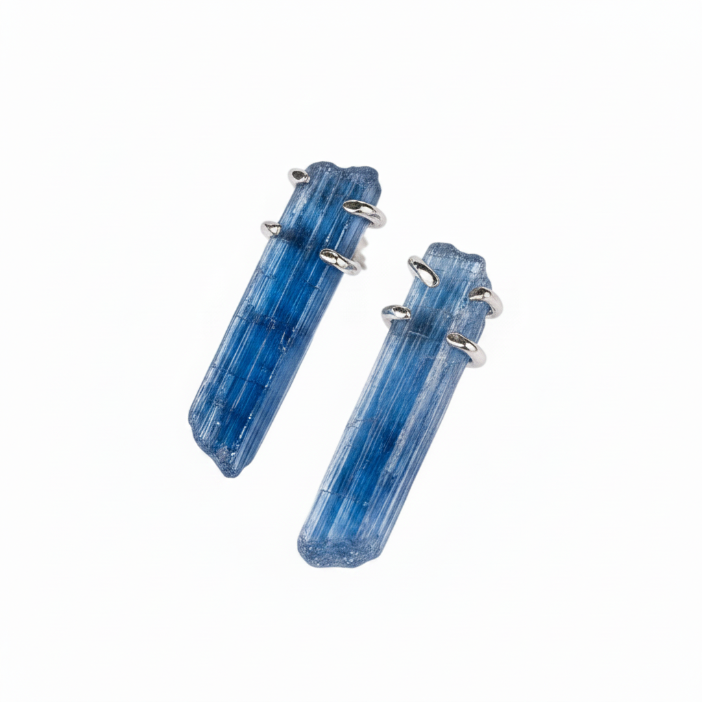 Pair of blue kyanite crystal earrings on a white background