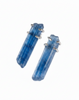 Pair of blue kyanite crystal earrings on a white background