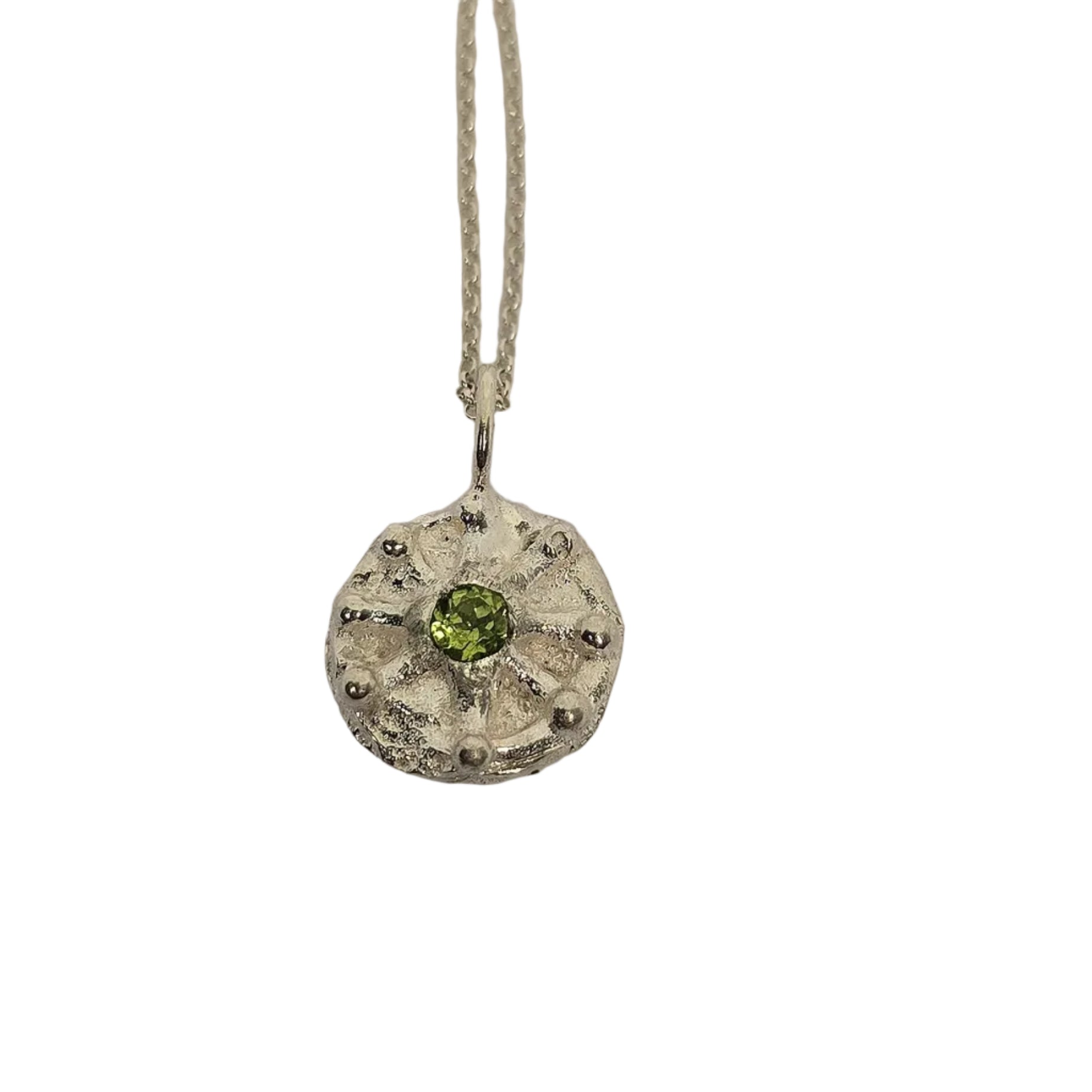 Silver necklace with a pendant featuring a green peridot gemstone , bohemian jewellery, irish design, pagan necklace, belfast city